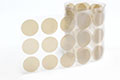 High-Density Teflon tape w/ silicone adhesive, 1" diameter discs High-Density Teflon tape w/ silicone adhesive, 1" diameter discs